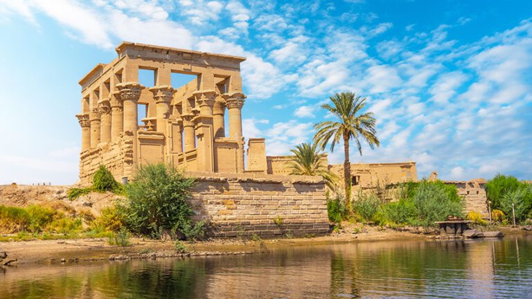 The beautiful temple of Philae and the Greco-Roman buildings seen from the Nile river